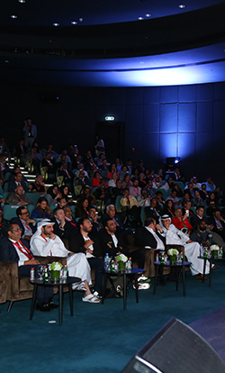  People enjoying a live event at an auditorium in Dubai 